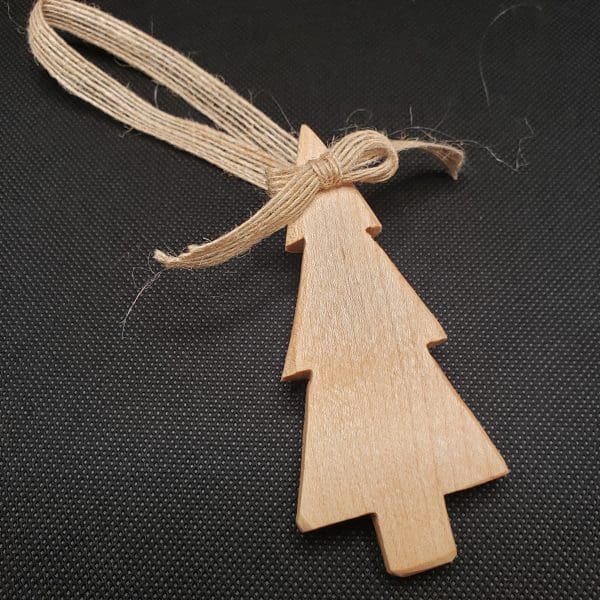 The Maple Wood Christmas Tree Ornament from JUstenbois measures approximately 4 inches x 1 3/4 inches